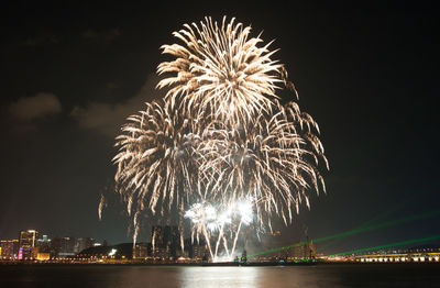 Scenic view of firework display at night