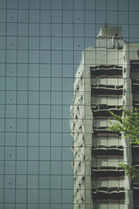 Low angle view of modern building against sky