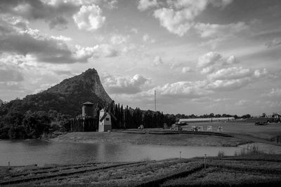 Scenic view of landscape against cloudy sky