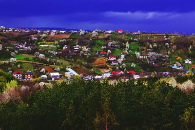 Residential buildings against cloudy sky