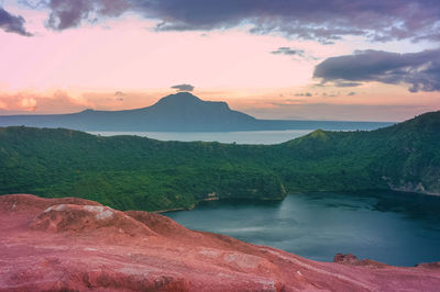 Scenic view of sea against cloudy sky