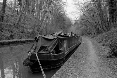 Close-up of boat moored in water