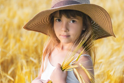 Young woman wearing hat