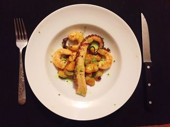 Directly above shot of seafood served in plate on table