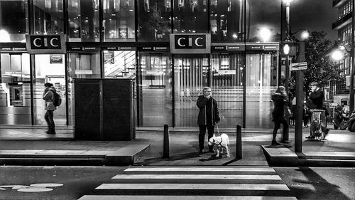 Men on bicycle in city