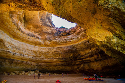 Group of people in cave