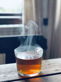 Close-up of tea in glass on table