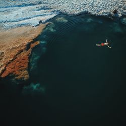 Man swimming in sea