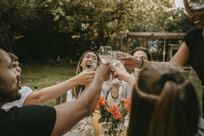 People in front of a drinking glass