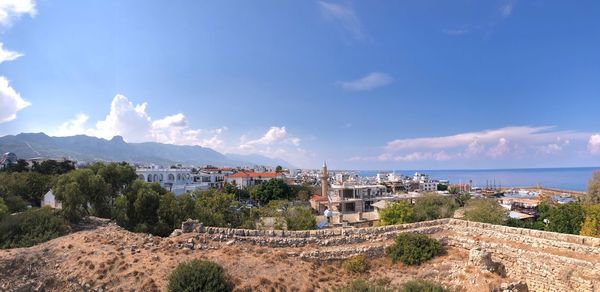 Panoramic shot of buildings against sky