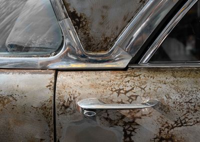 Close-up of old dirty car