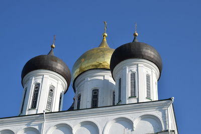 Low angle view of building against blue sky