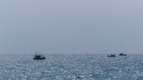 Boats on the horizon at koh rong island