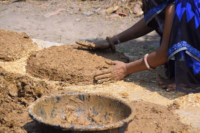 Midsection of woman working