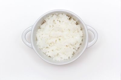 Close-up of breakfast served on white background