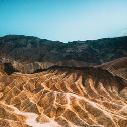 Scenic view of mountain range against clear sky