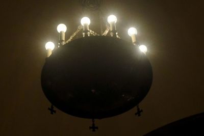 Low angle view of illuminated lamp