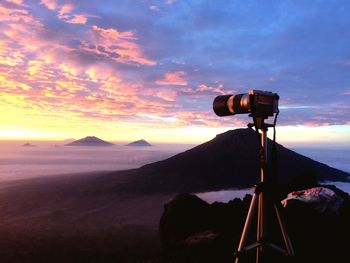 Scenic view of mountains against sky during sunset