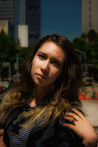 Close-up portrait of smiling young woman