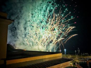 Firework display at night