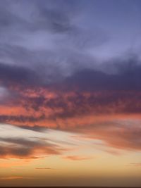 Low angle view of dramatic sky during sunset