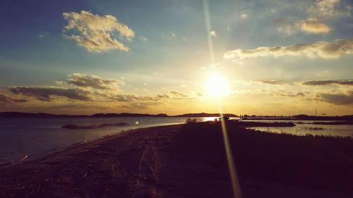 Scenic view of sea at sunset