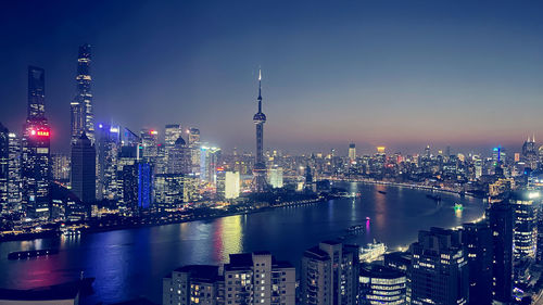 Illuminated buildings in city at night