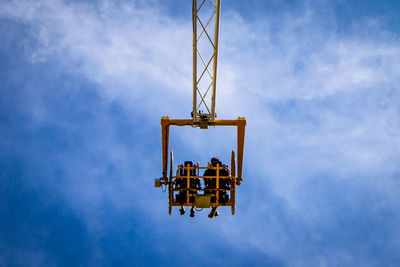 Low angle view of crane at construction site