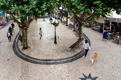 High angle view of people on street in city