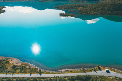 Aerial view of lake and road