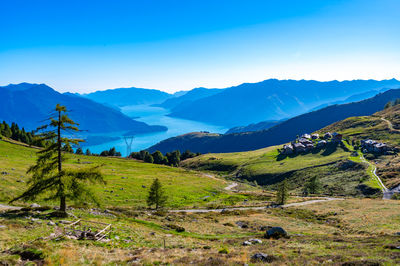 Lake como, seen from montemezzo, with the towns and mountains above it.