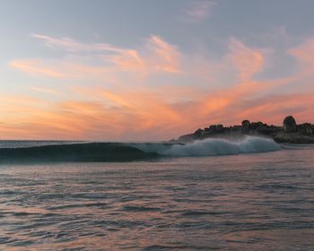 Scenic view of sea against sky during sunset