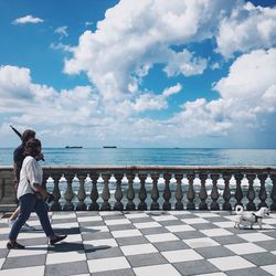 Scenic view of sea against cloudy sky