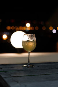 Close-up of wine glass on table