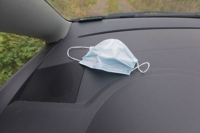 Close-up of white car on windshield