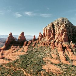 Rock formation on mountain against sky