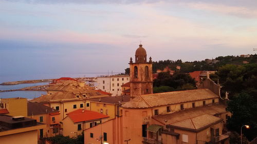 Cathedral in city against sky