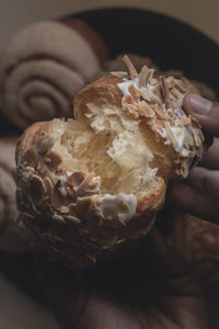 Close-up of hand holding ice cream