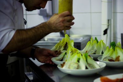 Chef preparing food in kitchen