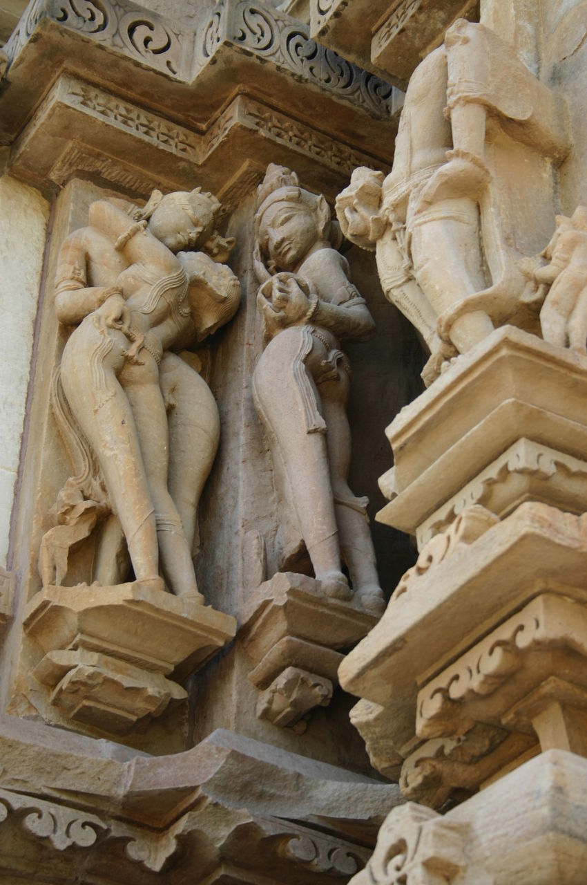 LOW ANGLE VIEW OF STATUES ON BUILDING