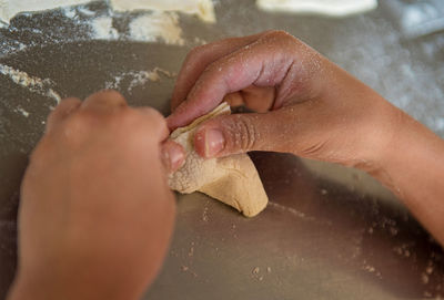 Close-up of person preparing food