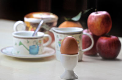 Close-up of coffee cup on table