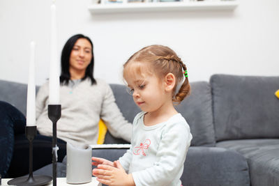 Full length of friends at home