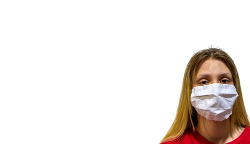 Portrait of a young woman over white background