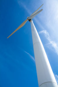 Low angle view of wind turbine against sky