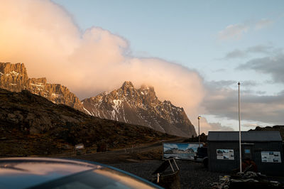 Panoramic view of snowcapped mountains against sky during sunset