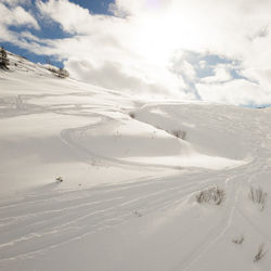 Scenic view of snow covered mountains