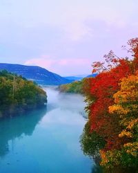 Scenic view of lake against sky during autumn