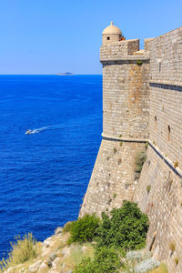 View of sea against blue sky