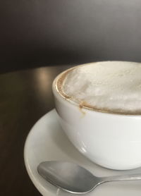 Close-up of coffee cup on table